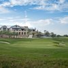 A view of the clubhouse with green in foreground at Cordillera Ranch Golf Course