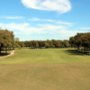 A sunny summer day view of a fairway at Luna Vista Golf Course.