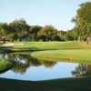 A view over the water of a hole at Brackenridge Park Golf Course.