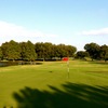 The 18th hole at Austin's Jimmy Clay Golf Course is narrow and features water on each side of the fairway