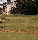 Approach to green over the creek on the double-dogleg No. 16.